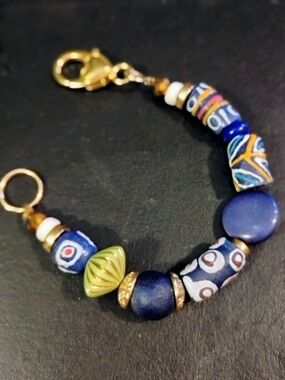 Hand Crafted Multicolor Bead Bracelet with Blue and Gold Accents